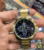 Luxury men's gold chain watch with black dial and Roman numerals.